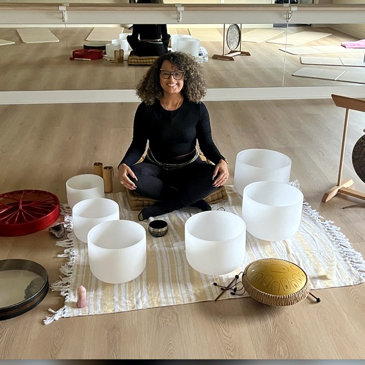 Dr. Sharon Washington with sound healing instruments