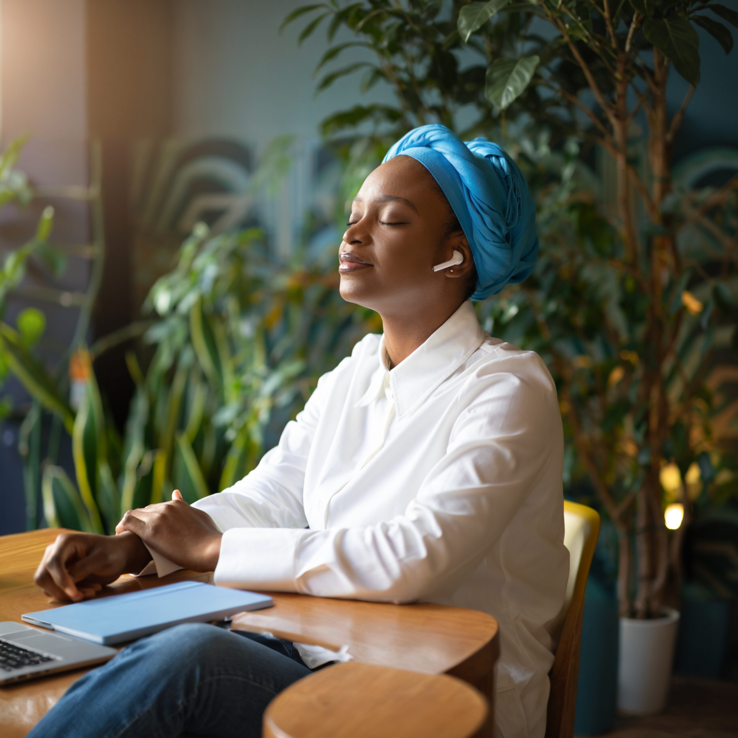 Peaceful listener relaxing with music